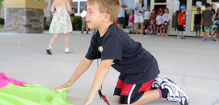 Five-year-old Nicholas Messer tried to collect as many clouds on the end of his nose as possible.