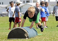 Six-year-old Dylan Elder couldnâ€™t wait to show off his skills during an agility drill.
