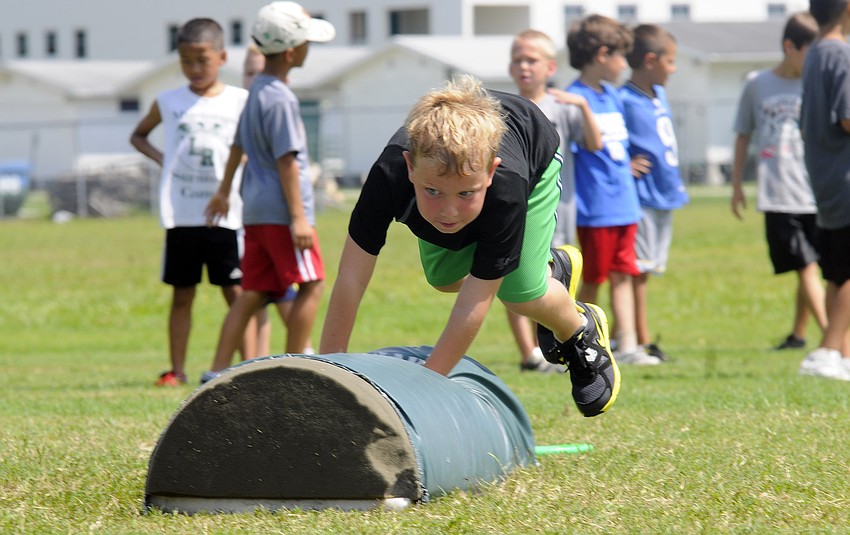 Six-year-old Dylan Elder couldnâ€™t wait to show off his skills during an agility drill.