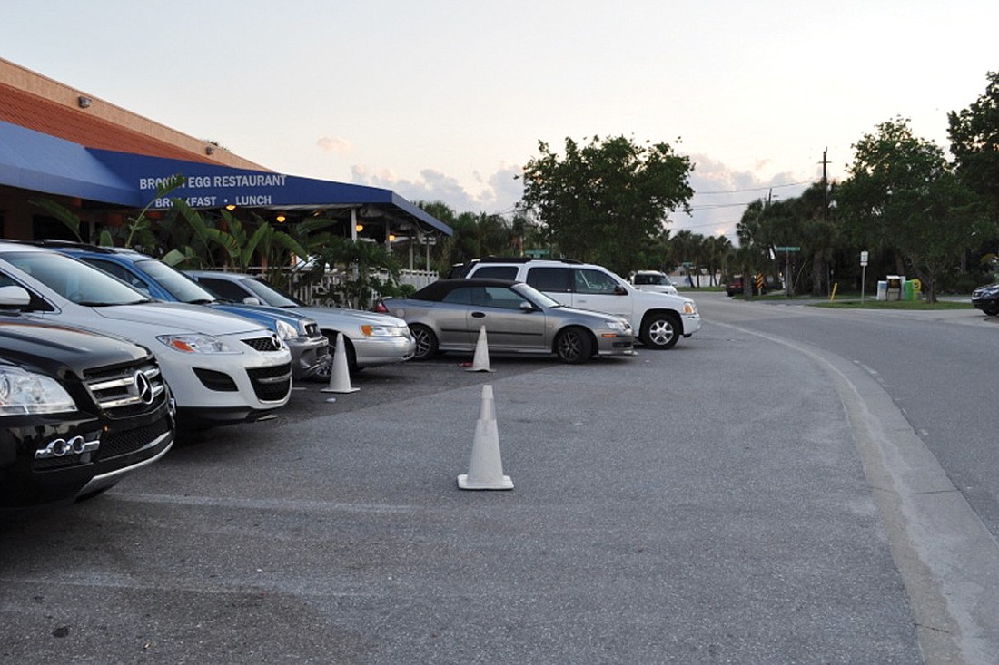 Chris Brown, owner of the Beach Club, The Hub Baja Grill and the property of Blu Que Island Grill on Siesta Key, leases space in front of the Broken Egg to provide valet parking.
