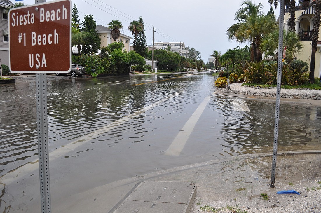 The 0.7-mile stretch of road from 604 Beach Road to the main entrance of Siesta Key Beach is closed due to flooding.