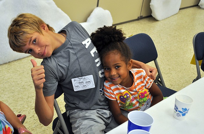 Students Corey and Brianna enjoy their snack.