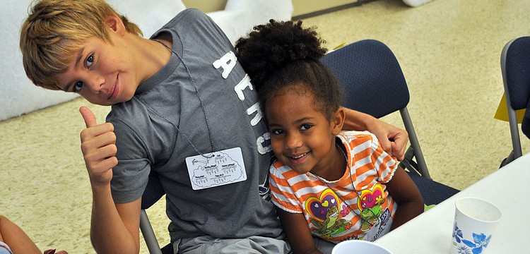 Students Corey and Brianna enjoy their snack.