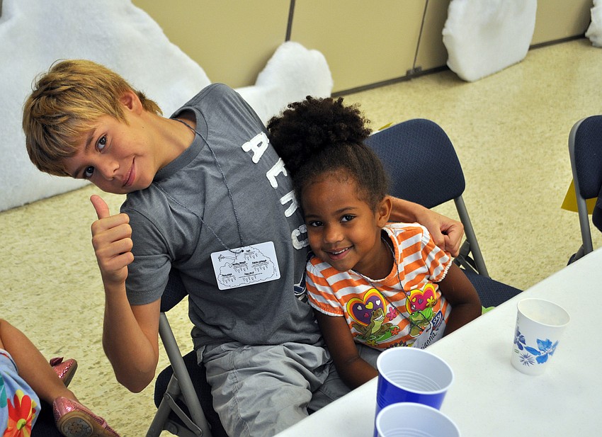 Students Corey and Brianna enjoy their snack.