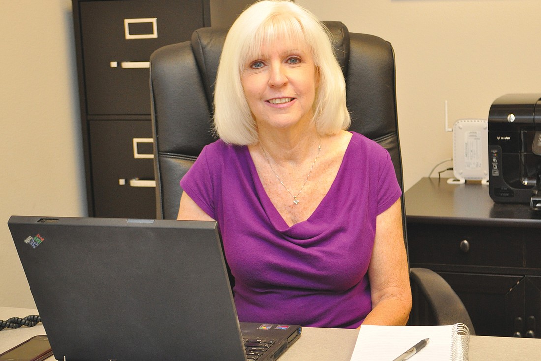 Founder of Elite Family Care, Debra Fortosis, takes a break from arranging nanny and sitter services.