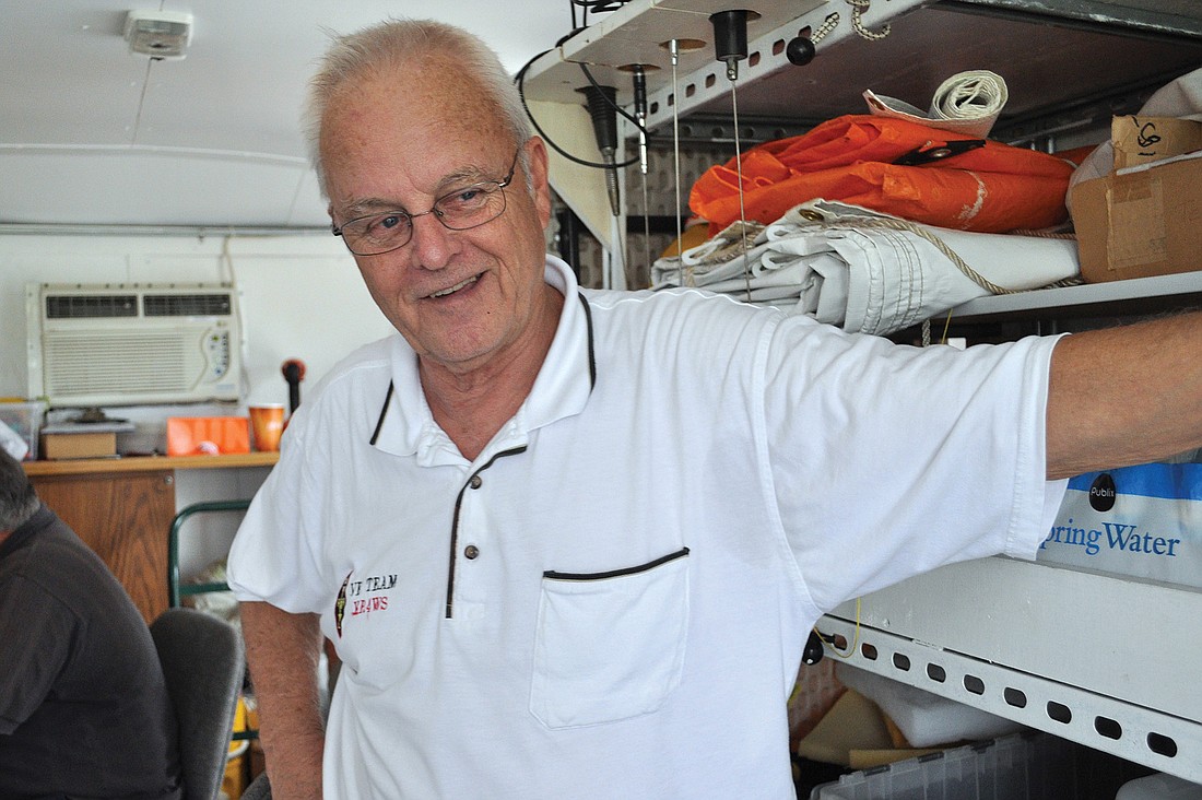Roger Byron provides assistance to amateur radio operators who had never participated in a field day.