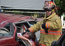 East Manatee Fire Rescue Firefighter Joe Griffith checked on a crash victim during a simulation.