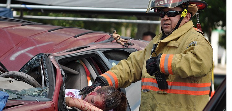East Manatee Fire Rescue Firefighter Joe Griffith checked on a crash victim during a simulation.
