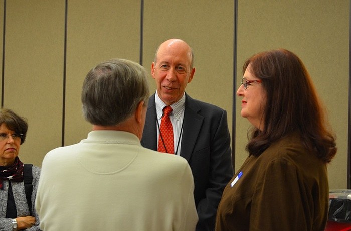 City manager candidate Thomas Barwin interacts with city residents Friday night.