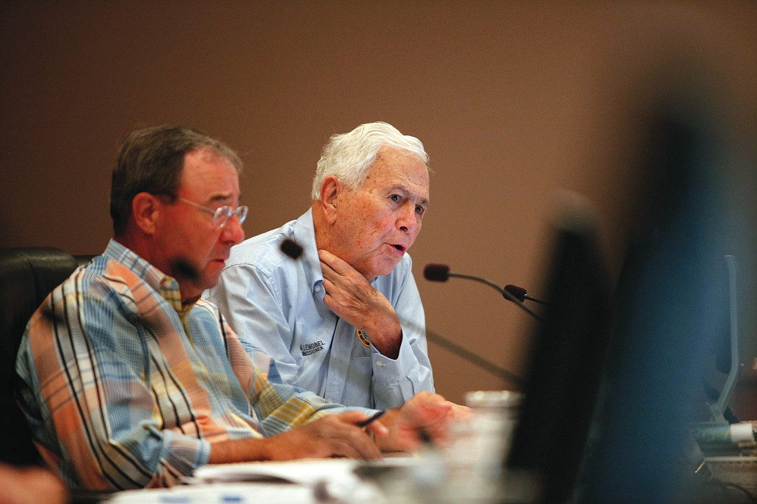 Commissioner Hal Lenobel, right, pictured with former Commissioner Bob Siekmann.
