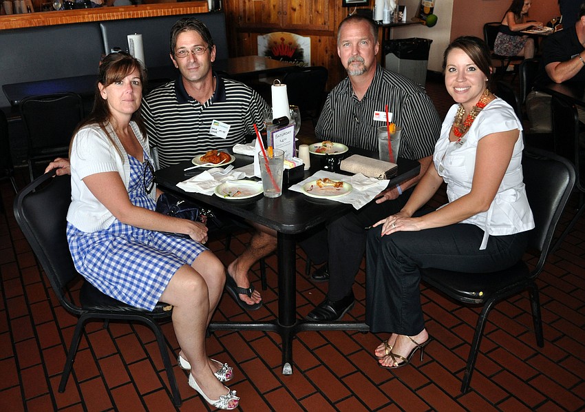 Kerrie and Dale Miley with Steve Evans and Amanda Pandorf, Monday, July 9, at the Sarasota Chamber of Commerce's event at Findaddy's.