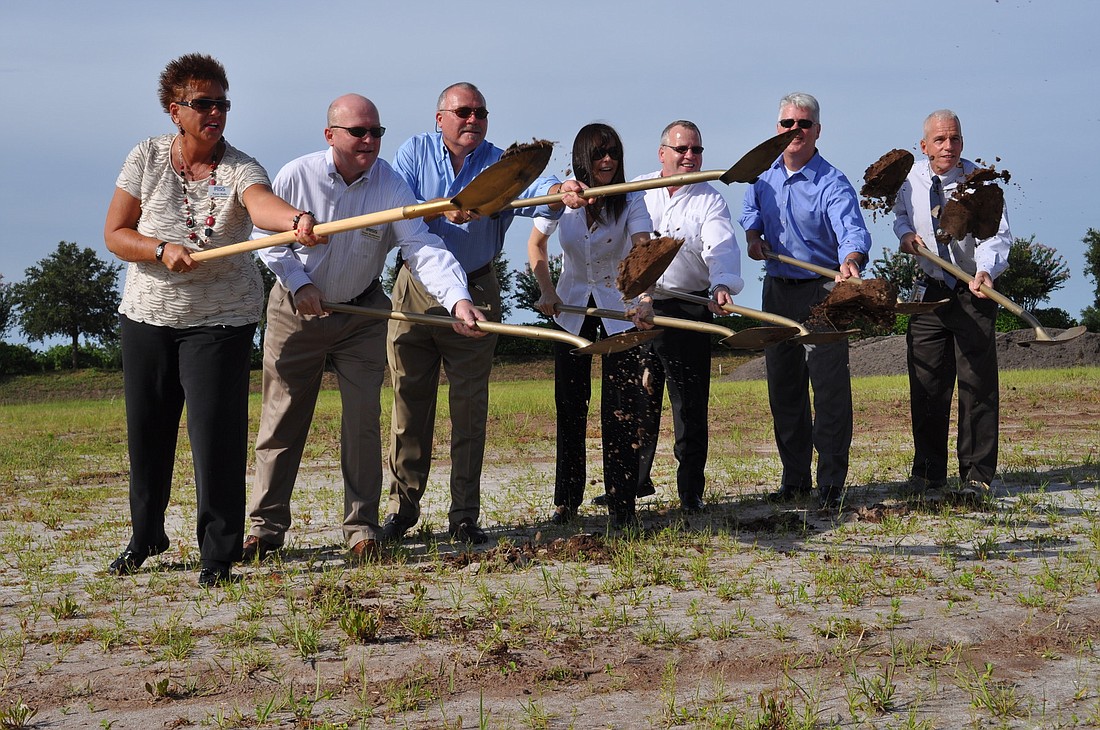 Karen Wells, Peter Anderson, Fred Starling, Deborah and Martin Robinson, Brian Kennelly and Manatee County Commissioner John Chappie shoveled dirt for the ground-breaking ceremony.