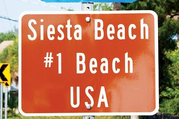 Visit Sarasota is working with the Siesta Key Village Association to modify "Number 1 Beach" signs for long-term use.