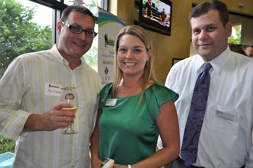 Chiropractor Abe Kozma with Sheila Anthony, of PNC Bank, and Brian Best, of PNC Investment