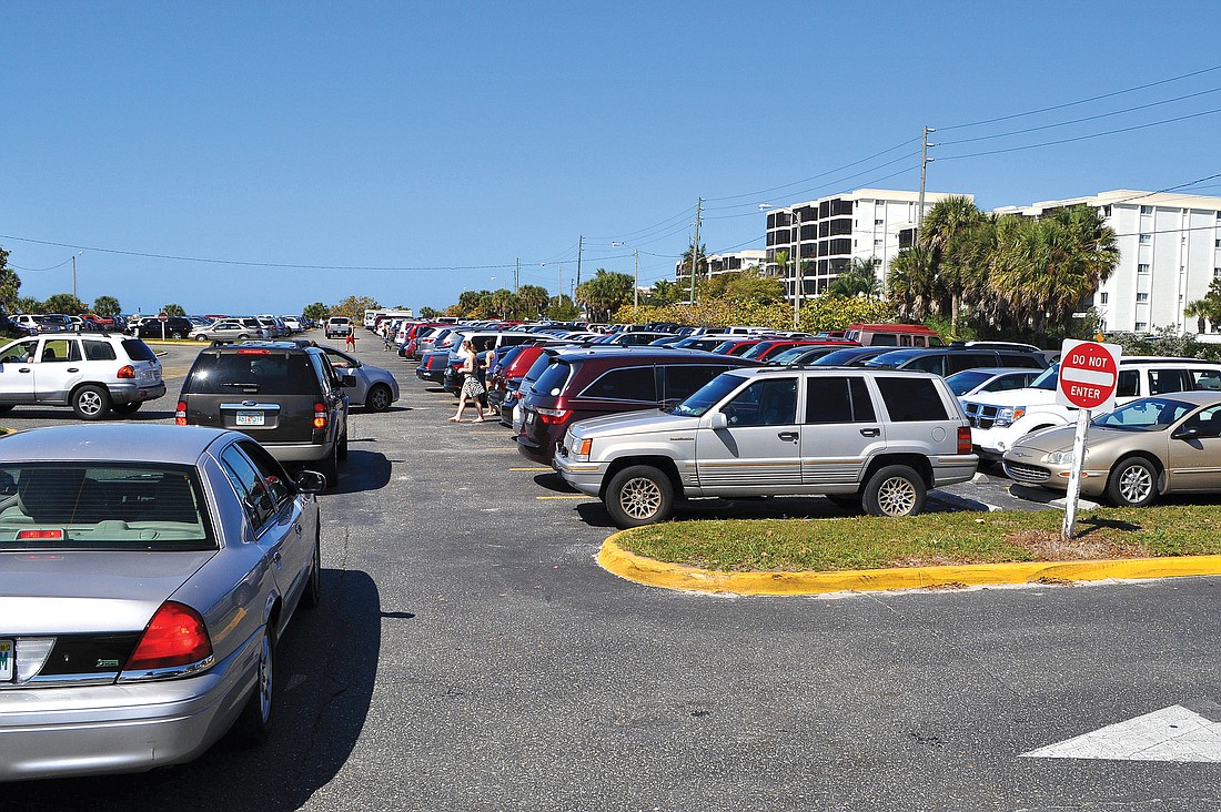 Sarasota County Commissioner Nora Patterson has been alerted via email again that when the Siesta Key main public beach parking lot is full, Siesta residents offer up their residential properties as parking lots for money. File photo.