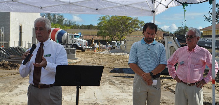 Publix Vice President of Lakeland Operations Tom McLaughlin, pictured with Publix agent Michael Leeds and Mayor Jim Brown speaks about the new store.