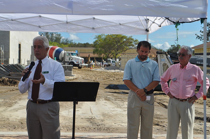 Publix Vice President of Lakeland Operations Tom McLaughlin, pictured with Publix agent Michael Leeds and Mayor Jim Brown speaks about the new store.