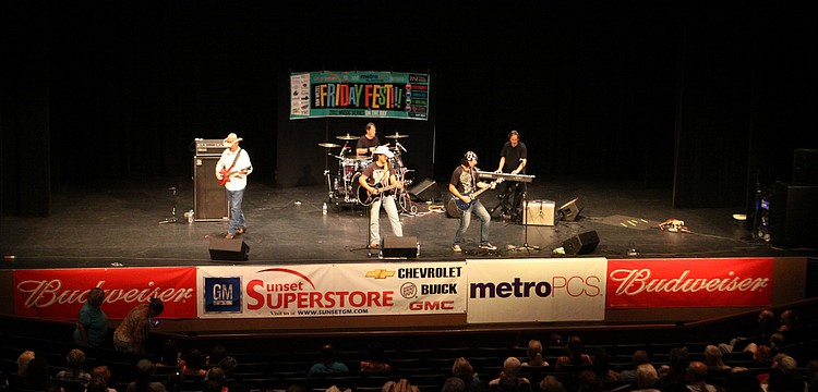 Adrian Ray and his band rocked out, Friday, July 13, at Friday Fest inside the Van Wezel auditorium.