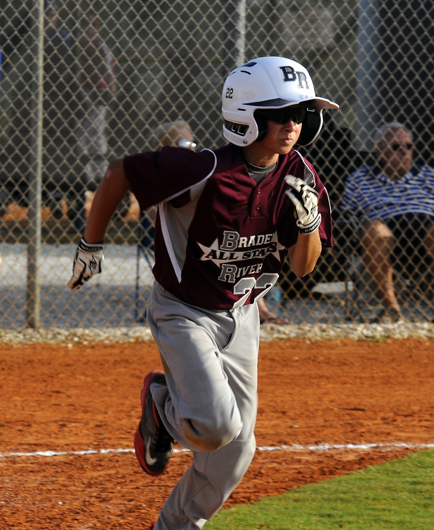 Allen Bass races down the first base line after notching a hit for Braden Riverâ€™s 9-10 All-Stars.