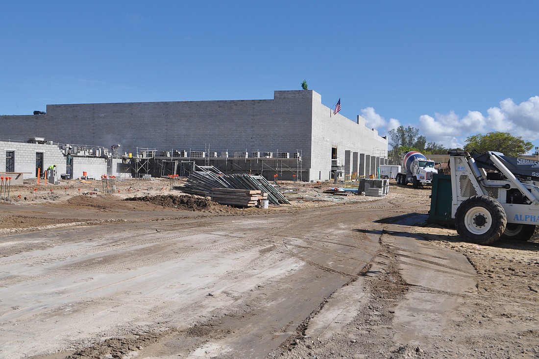 The area with beams to the right will be the new Publix entrance, while the area to the left will become retail shops.