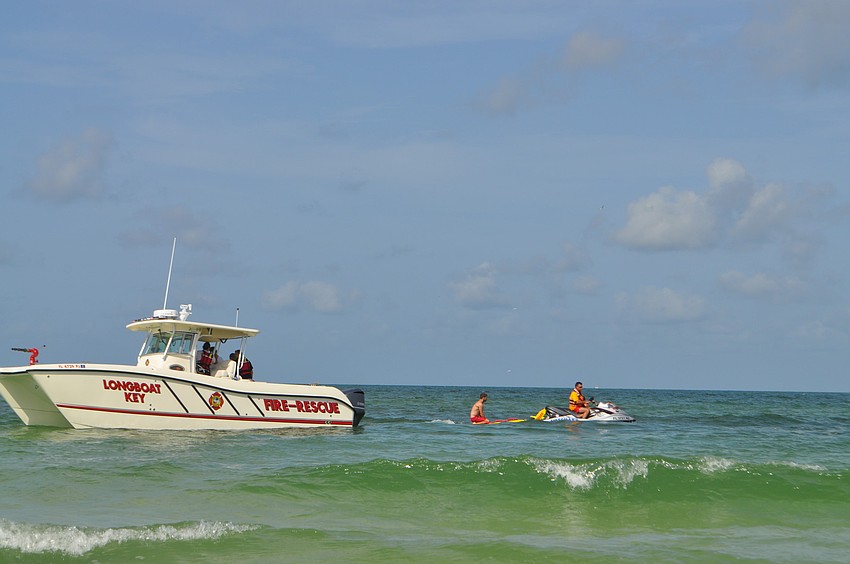 Longboat Key firefighters used the department's new rescue boat during drills with Manatee County lifeguards that involved a coordinated patient transfer from the lifeguards' Jet Ski and sleds to the boat.
