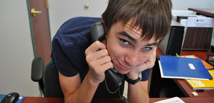 Jacob Sage greeted guests as they arrived at the Red Cross building.