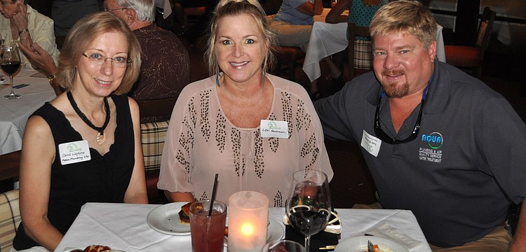 Carol Wojtyna with Lori and Todd Buchman