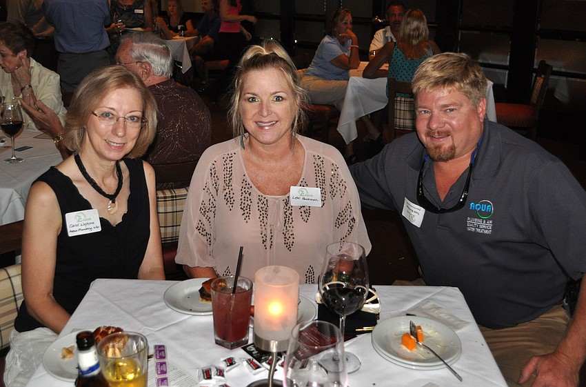Carol Wojtyna with Lori and Todd Buchman