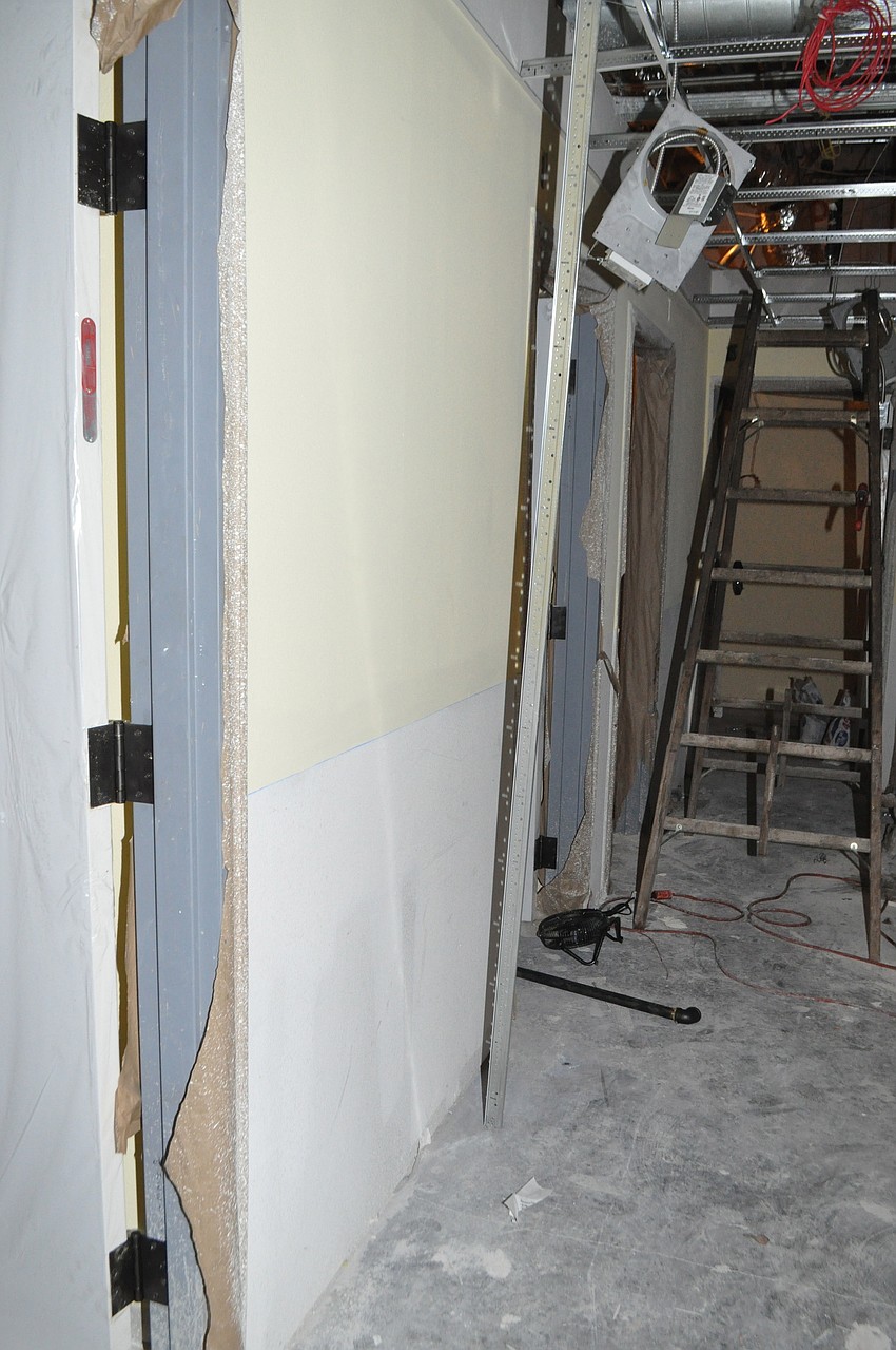 A hallway in the actor's loft that dressing rooms sit off of.