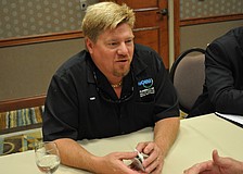 Todd Buchman, of Aqua Plumbing & Air, exchanged information with other participants.
