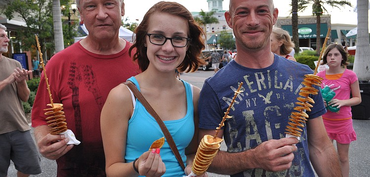 Jeff Horton enjoyed potato chips with members of his family, Courtney and Andrew Benear, who were visiting from Michigan.