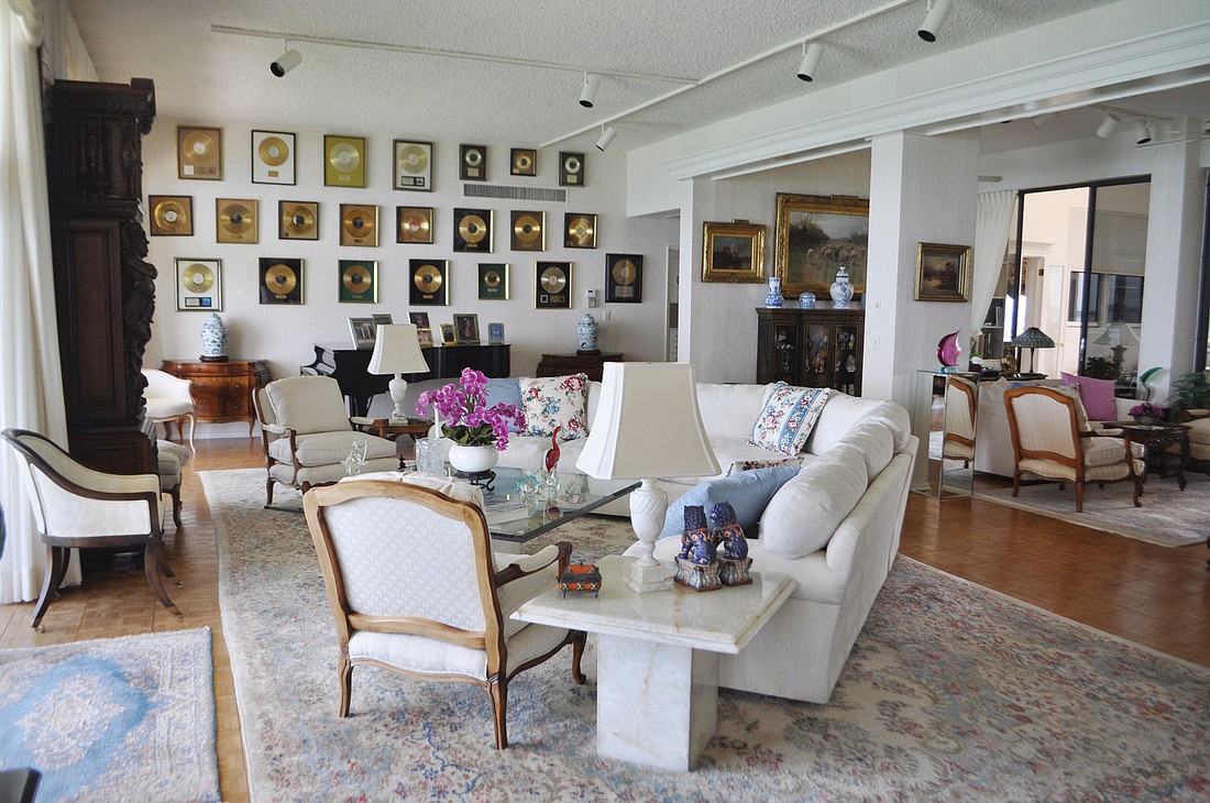 Art Ferrante's 22 gold records hang over the living room of the Longboat Key Towers penthouse.