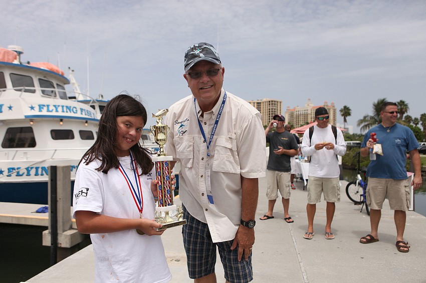 Jaimee Baker won a trophy for catching the most fish, a total of 21.
