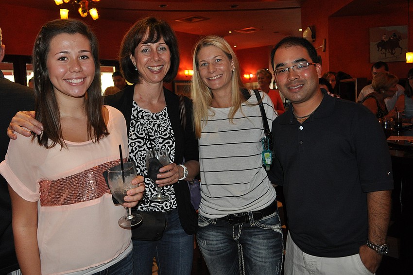 Samantha Haga came out to support her mom, Karen Haga, the event's beneficiary. They are pictured with friends, Drs. Sheryl and Jason Okuhara.