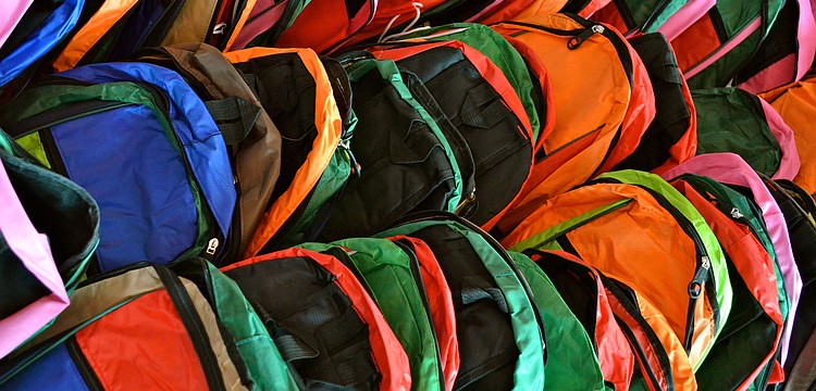 More than 1,000 backpacks were filled with school supplies for needy children.