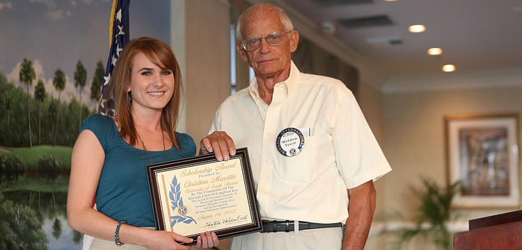 Christina Elizabeth Mascitto and Weldon Frost pose together, Thursday, August 16, at the Kiwanis Scholarship breakfast at the Longboat Boat Key Club. This is Mascittoâ€™s third time winning a scholarship from the Longboat Key Kiwanis Club.