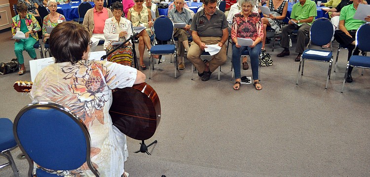 The crowd joined in to sing along with Roaslie Leon, Saturday, Aug. 18, during La La La Havdalah.