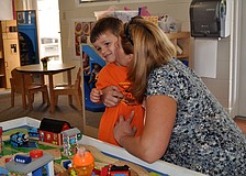 Olga Carr gives her son, Sean, 3, a hug and a kiss goodbye before leaving him at his first day of school for the year at St. Boniface Preschool.