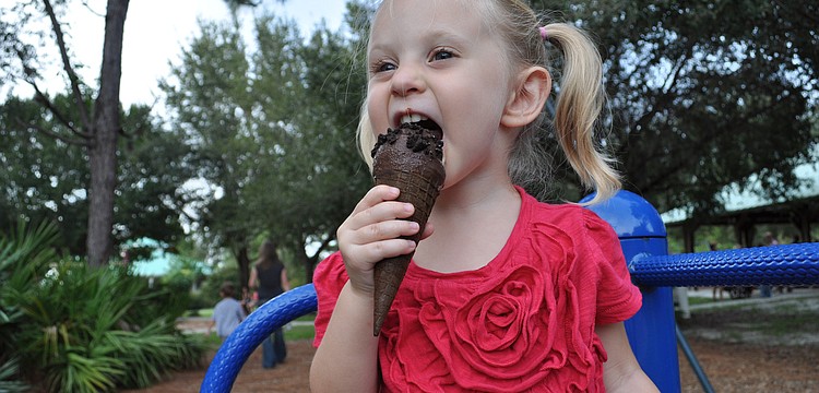 Madeline Gersh, 3, was more excited about eating her ice cream than playing.