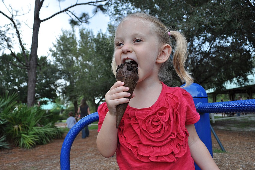 Madeline Gersh, 3, was more excited about eating her ice cream than playing.