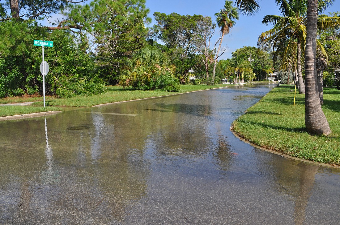 The intersection of Longboat Drive and Broadway was flooded around 10 a.m. Tuesday.