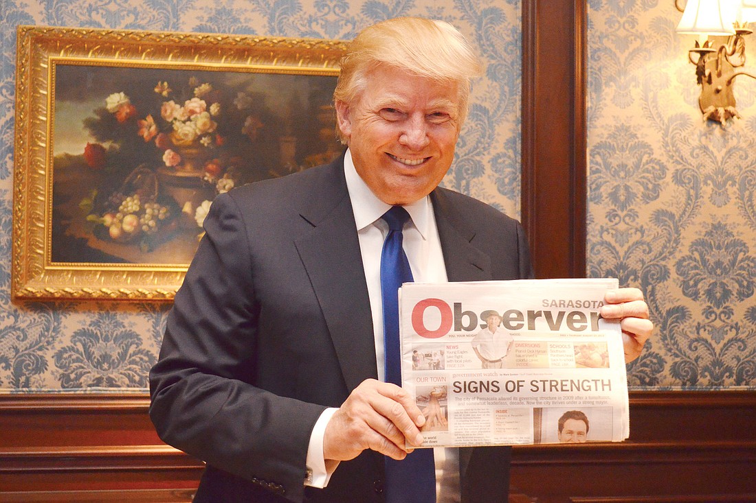 Donald Trump, holding his copy of the Sarasota Observer, told reporters during a press conference Sunday, at the Ritz-Carlton, Sarasota, that if President Barack Obama is re-elected, there might not be a country left in four years.