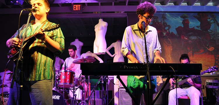 Jake Elrod and Caegan Quimby perform with Physical Plant.