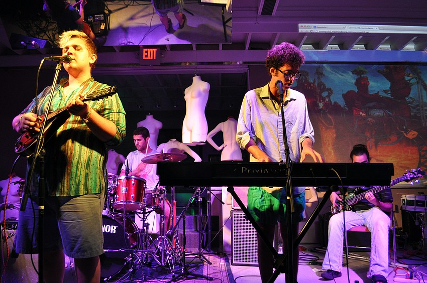 Jake Elrod and Caegan Quimby perform with Physical Plant.