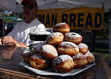 Strawberry filled Berliners with powdered sugar were on display at the Siesta Key Farmers Market Sunday, Sept. 1.