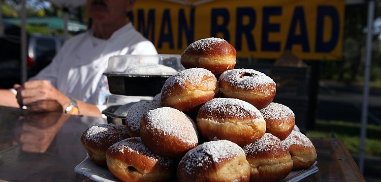 Strawberry filled Berliners with powdered sugar were on display at the Siesta Key Farmers Market Sunday, Sept. 1.