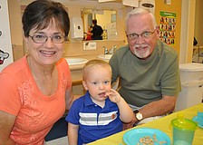 Patti and Ron Nelson ate with their grandson, Blake Nelson.