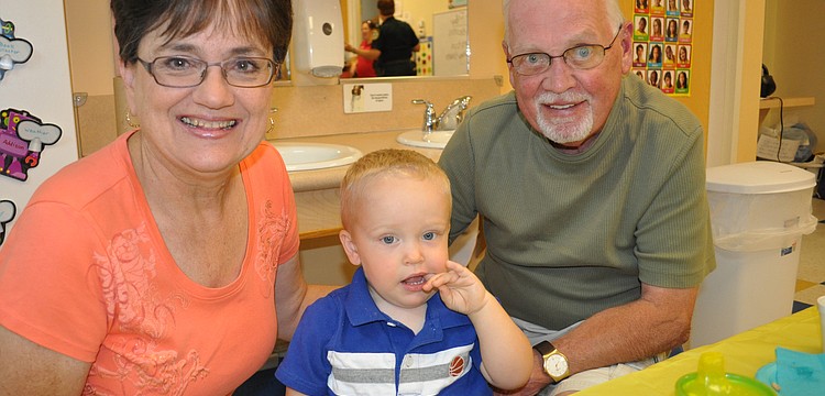 Patti and Ron Nelson ate with their grandson, Blake Nelson.