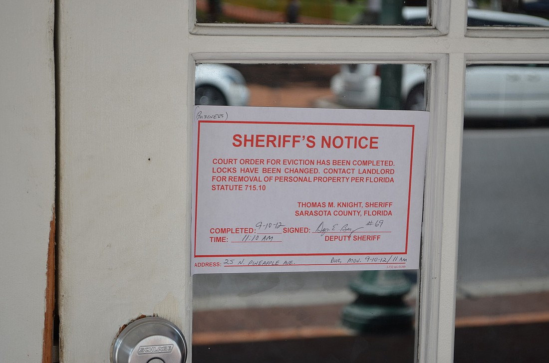 A Sheriff's Notice was put on the doors of 25 N. Pineapple at 11:10 a.m. stating that the eviction has been completed and the locks have been changed. Photo by Rodger Drouin