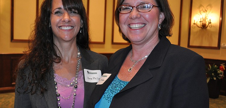 Jamie Phillips and Kristy Rhoden, of Shinn & Co.